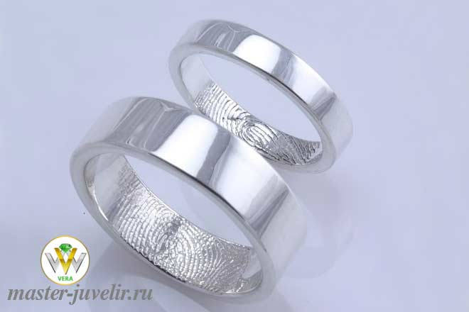 Купить обручальные кольца с отпечатками пальцев на внутренне стороне кольца в белом золоте в ювелирной мастерской