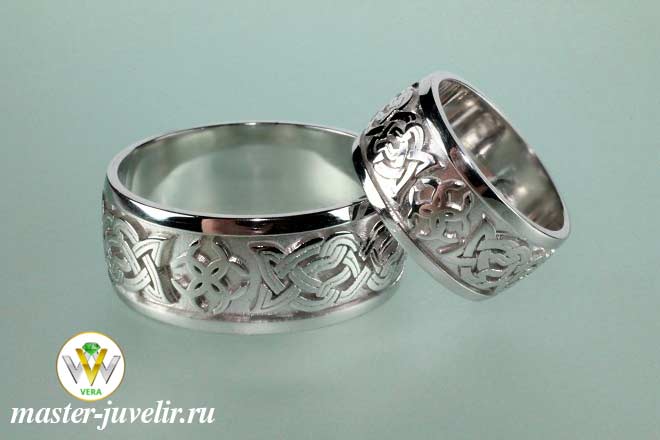 Купить обручальные кольца серебряные с узорами родированные в ювелирной мастерской