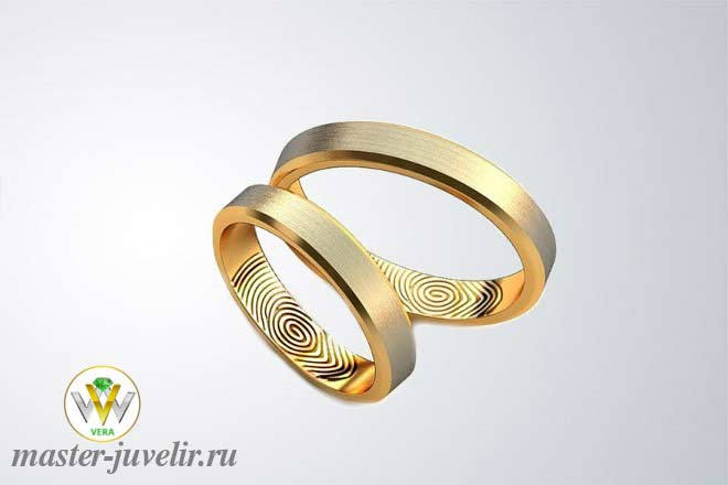 Купить обручальные кольца с отпечатками пальцев в желтом золоте в ювелирной мастерской