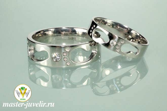 Купить обручальные кольца из платины с бриллиантами ножки в ювелирной мастерской