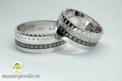Обручальные кольца необычные в белом золоте с бриллиантами 