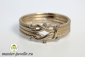 Золотое кольцо с бриллиантами в плетенном узоре