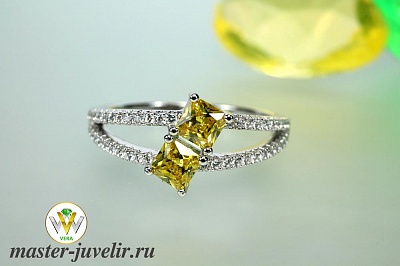 Серебряное кольцо с желтыми и белыми цирконами