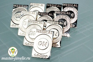 Значки золотые для Международной корпорации Medical On Group
