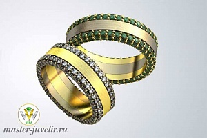 Обручальные кольца из желтого и белого золота с бриллиантами и изумрудами по краям колец