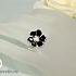 Кольцо из серебра в виде цветка с черной эмалью