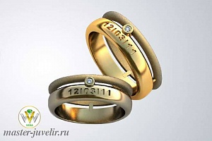 Кольца обручальные с символикой и бриллиантом 