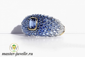 Дизайнерское серебряное кольцо с позолотой и цирконами