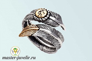 Необычное кольцо в виде пера с позолотой